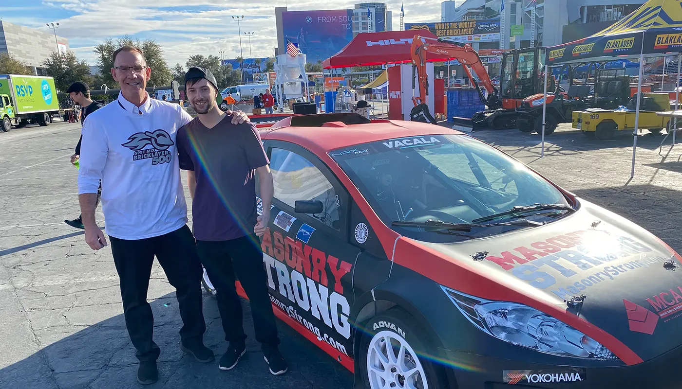 Todd Frederick with the Masonry Strong Car and Lane Vacala